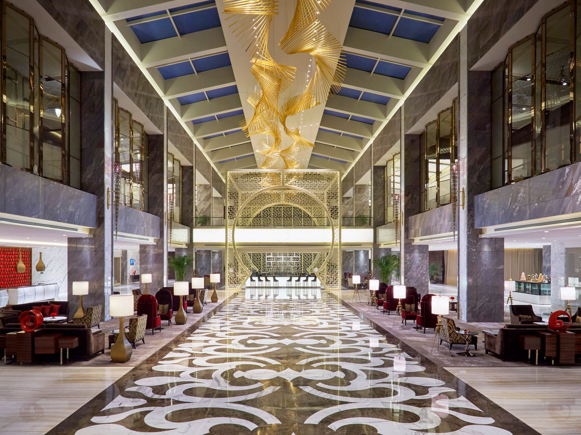 a large hall with chairs and a large ceiling