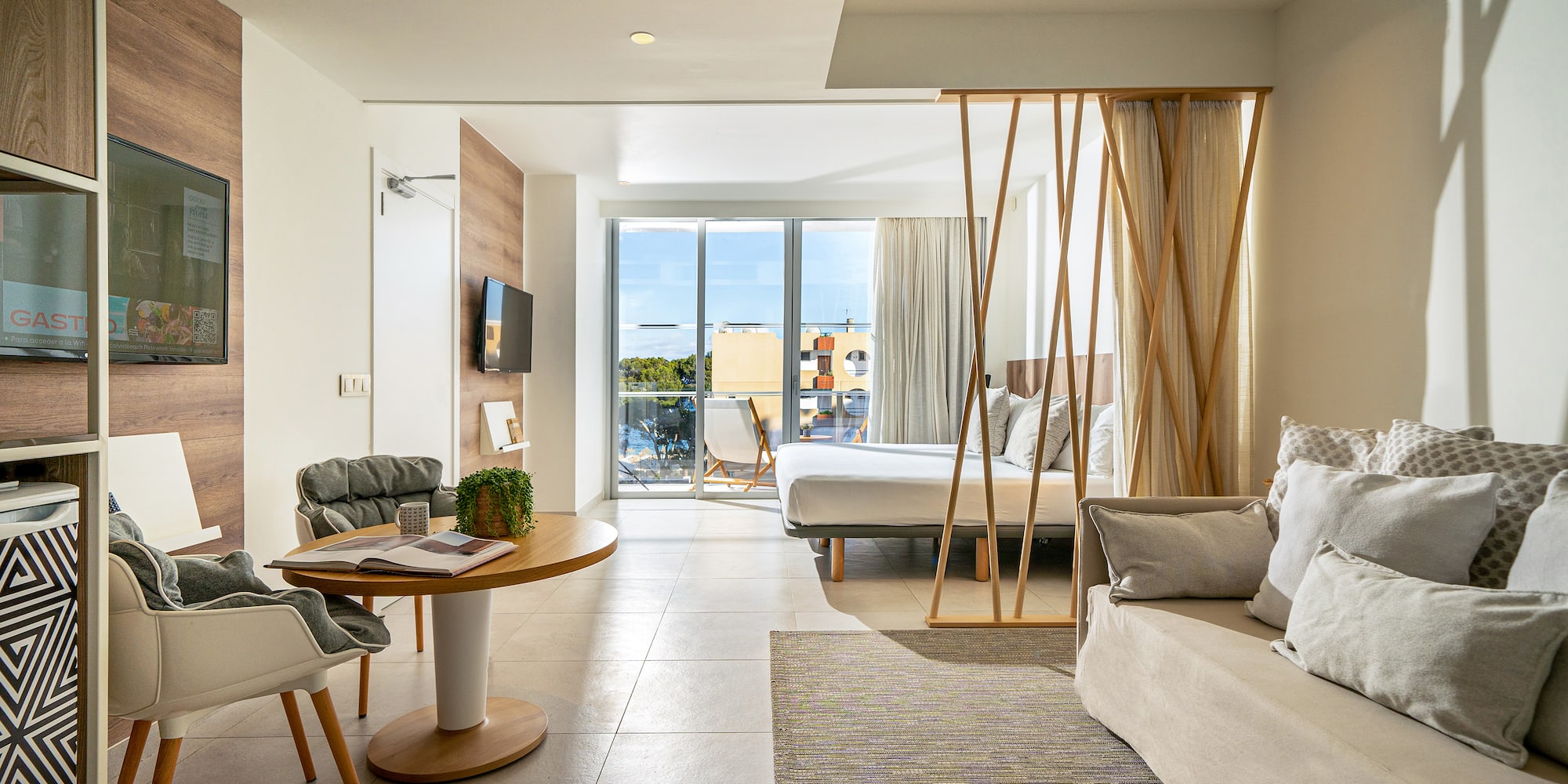 a room with a bed and a sofa