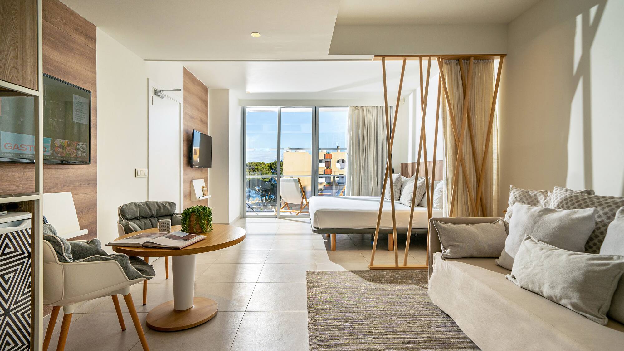 a room with a bed and a sofa