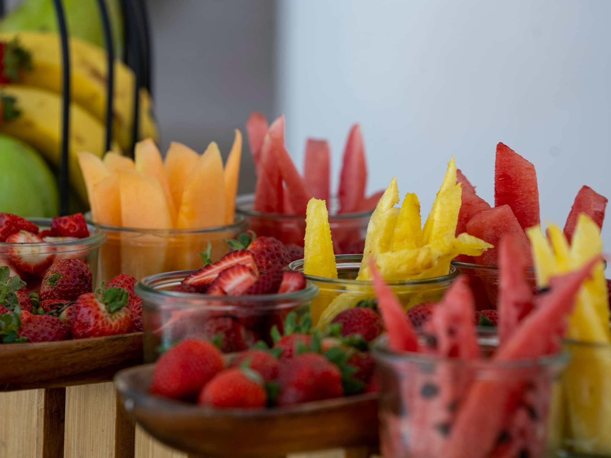 a group of bowls of fruit