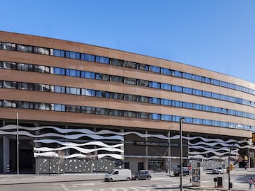 a building with cars parked in front of it