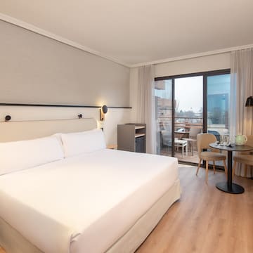 a room with a bed and a table
