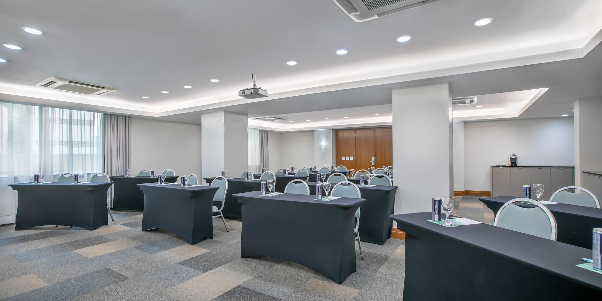 a room with tables and chairs