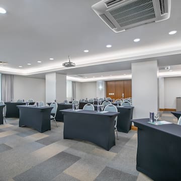 a room with tables and chairs