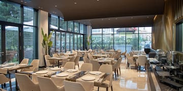 a room with tables and chairs