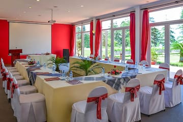 a room with tables and chairs