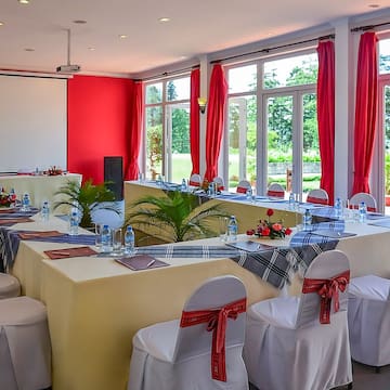 a room with tables and chairs