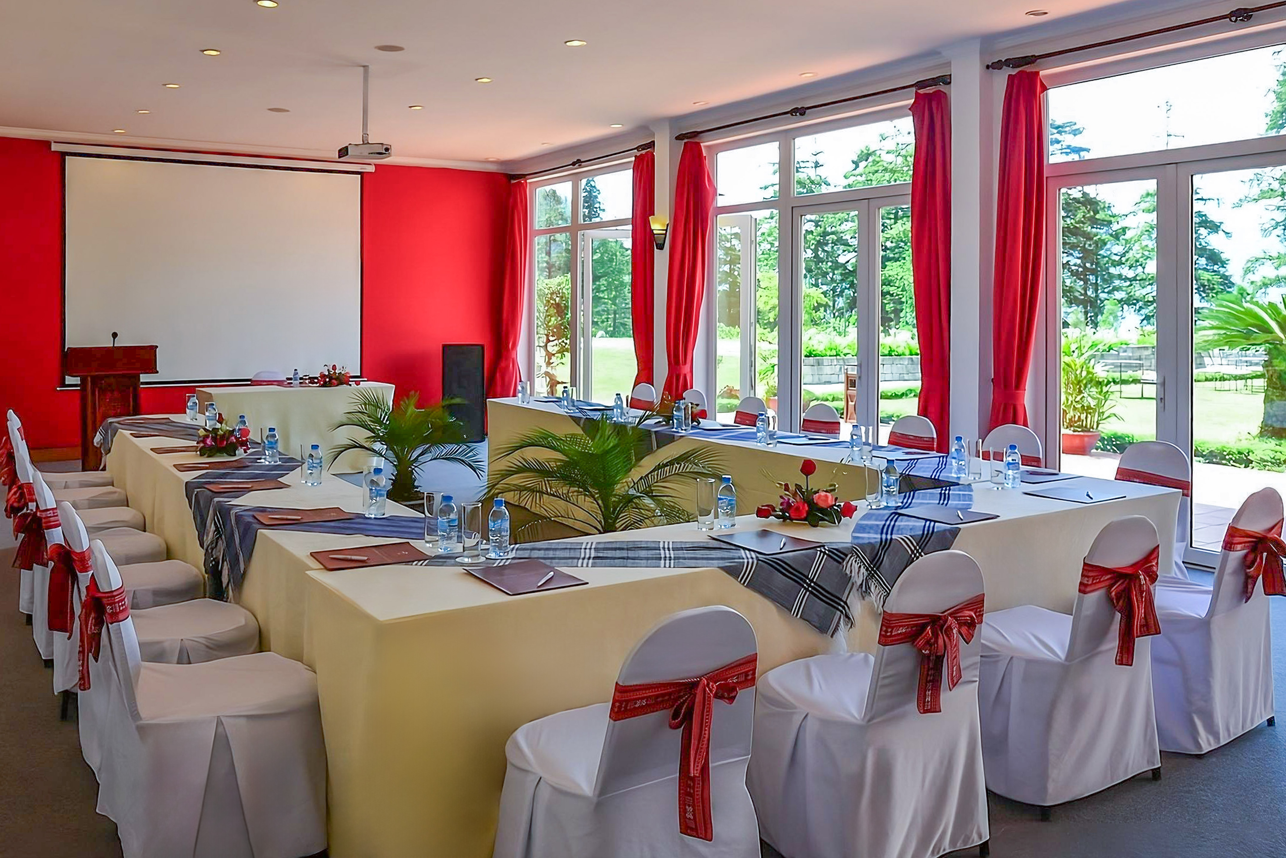 a room with tables and chairs