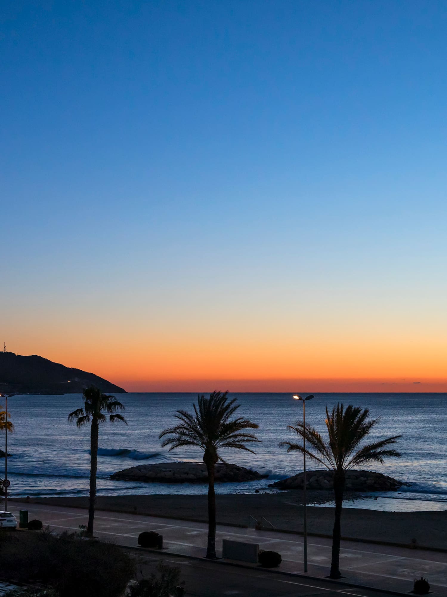 a sunset over a beach