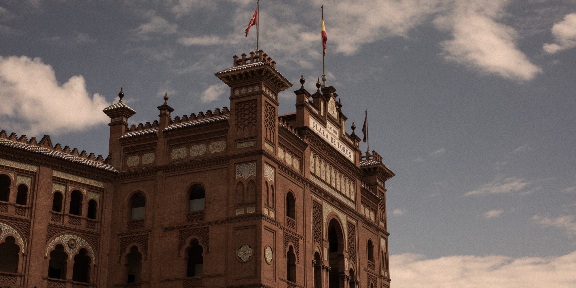 a building with flags on top