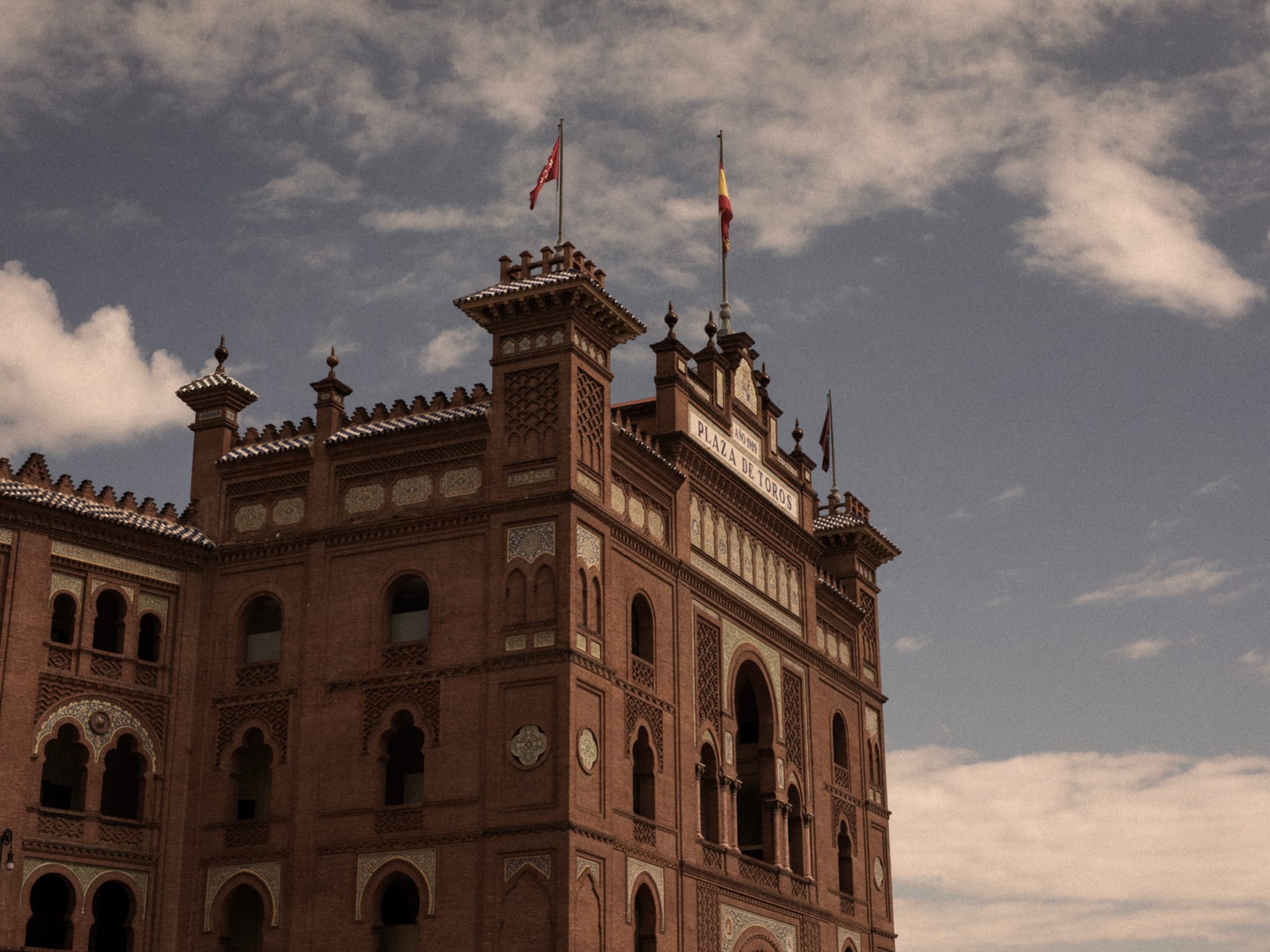 a building with flags on top
