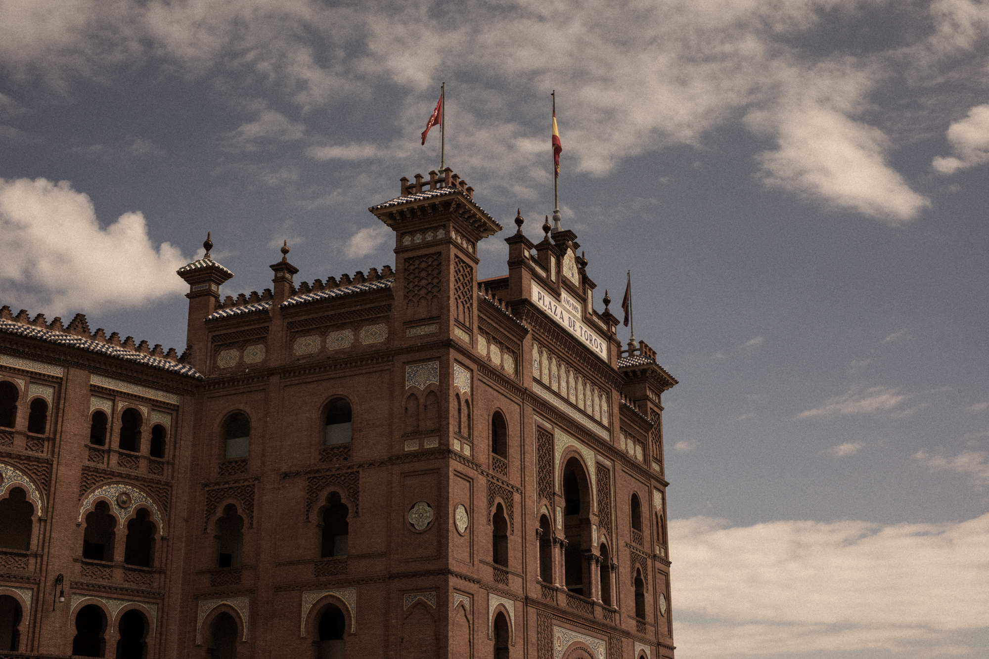 a building with flags on top