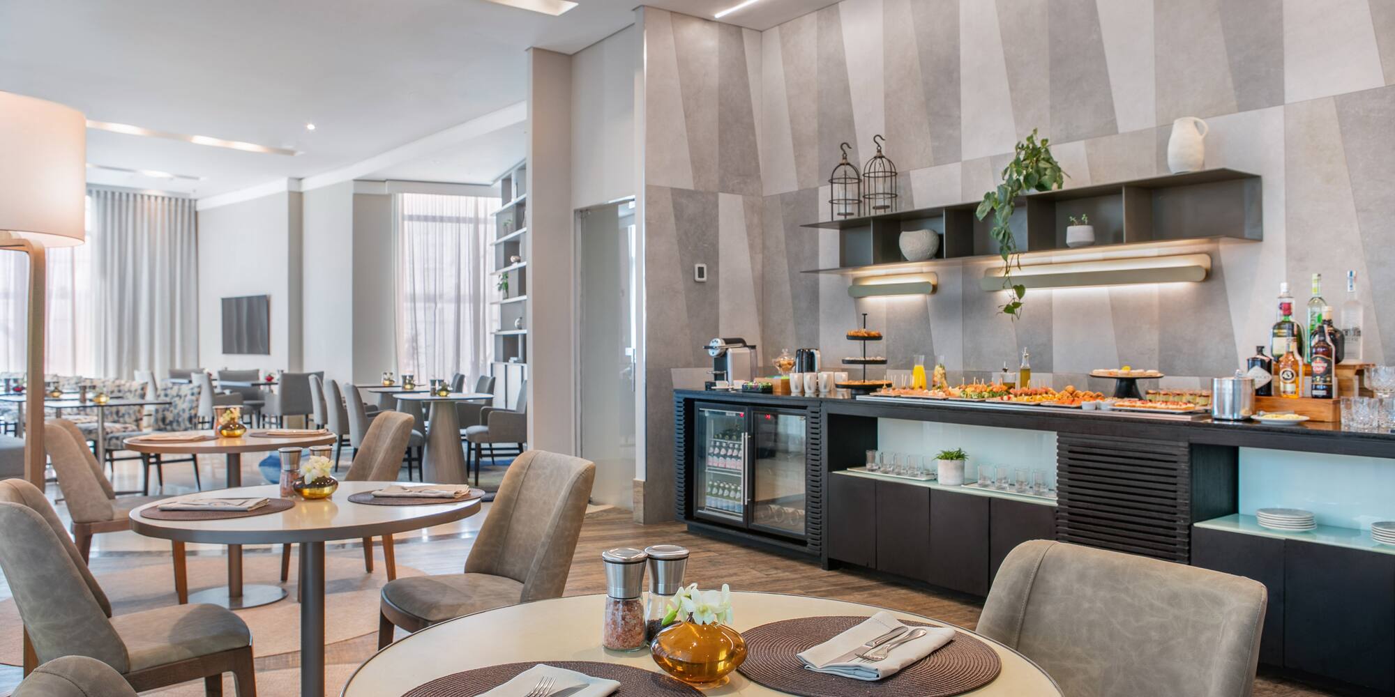 a buffet table with food and drinks