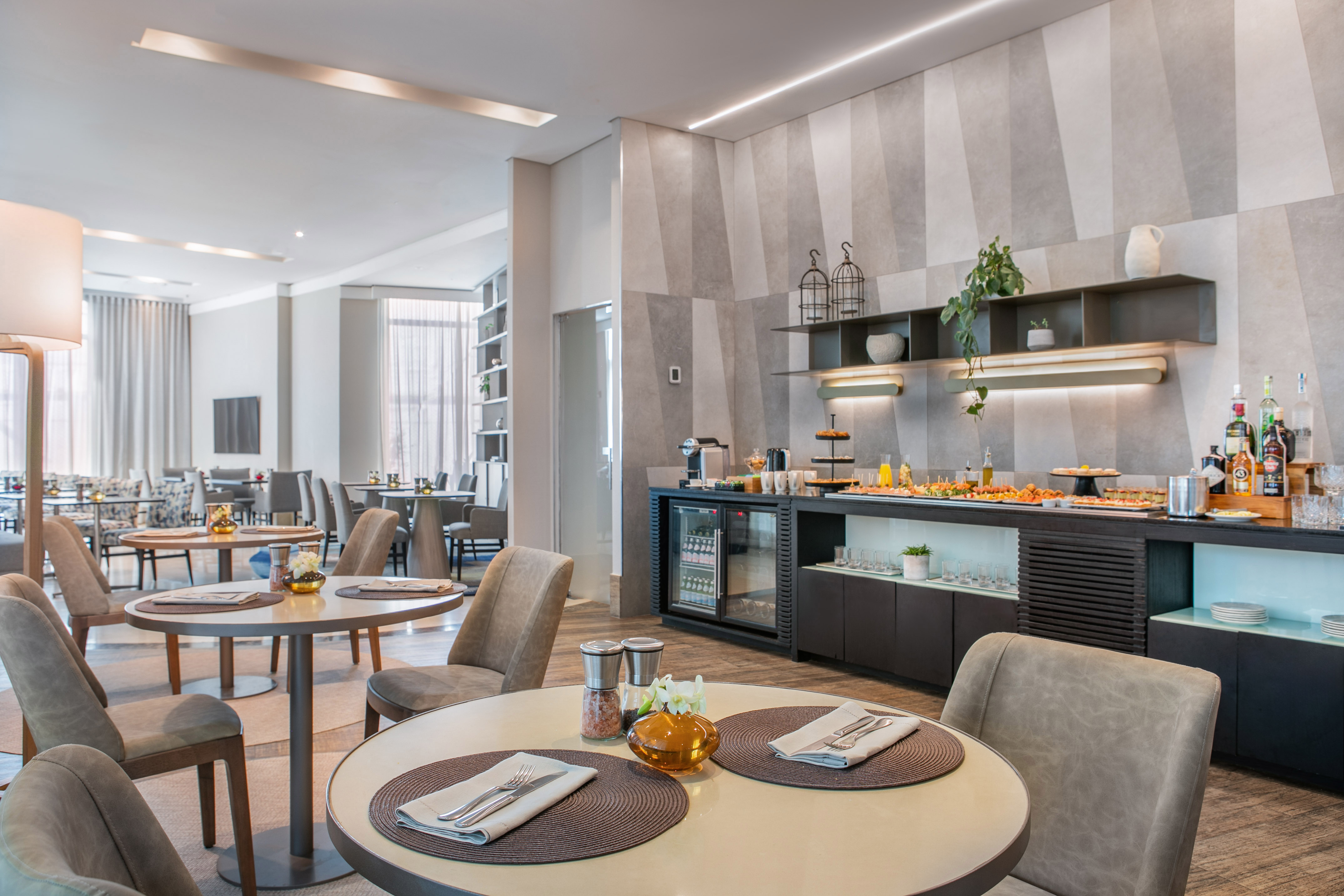 a buffet table with food and drinks