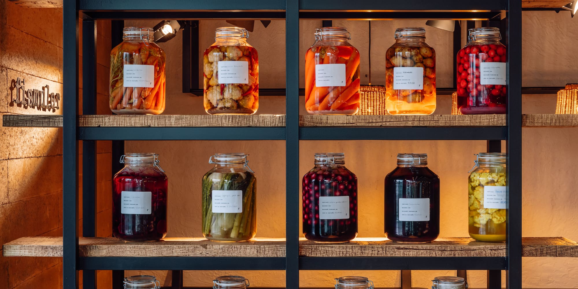 a shelf with jars of food
