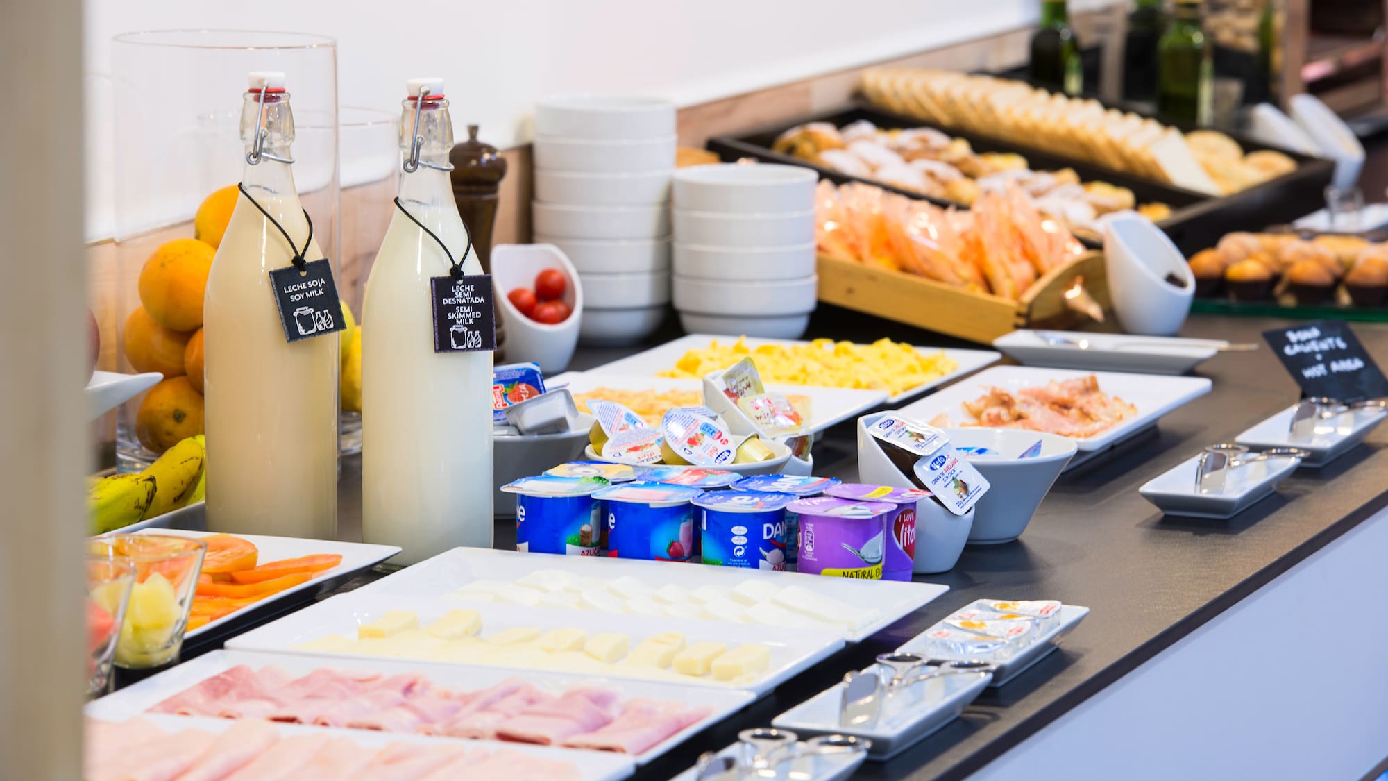 a buffet table with different foods