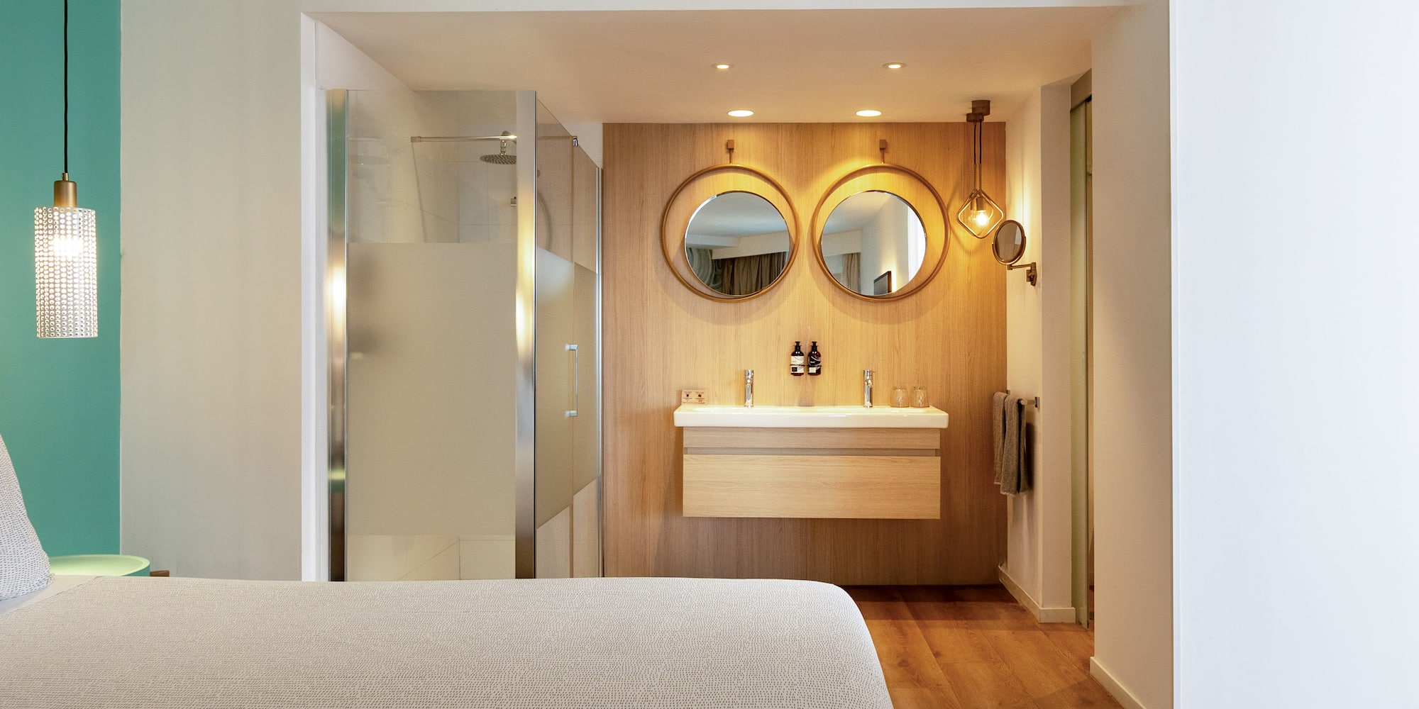 a bathroom with a mirror and a sink