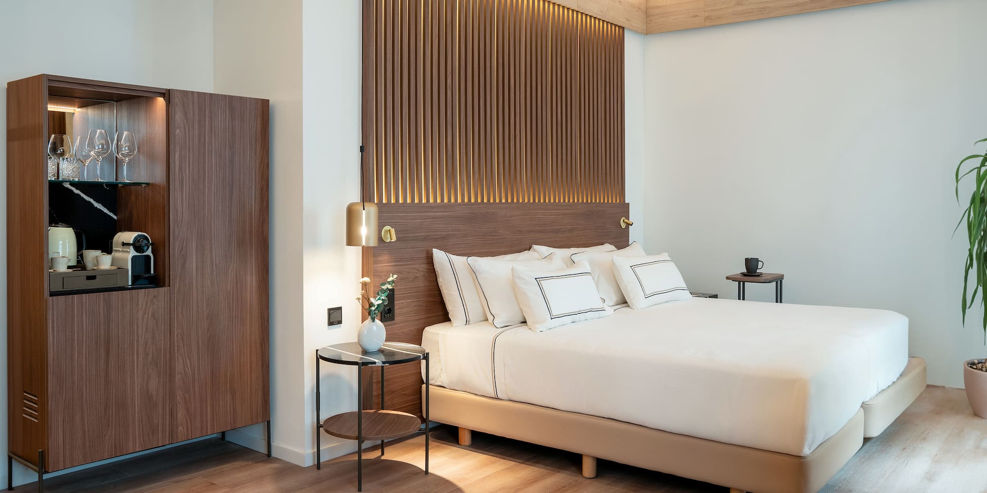 a bedroom with a bed and a cabinet