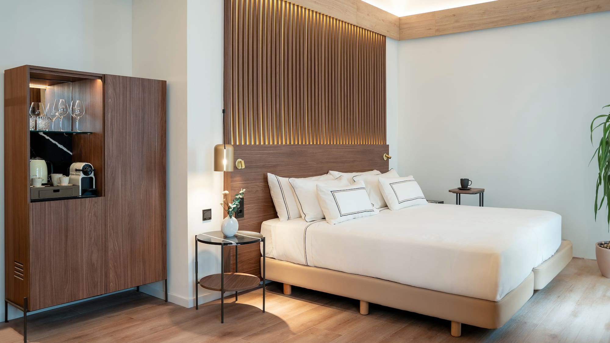 a bedroom with a bed and a cabinet