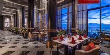 a large room with tables and chairs