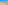 a beach with buildings and sand