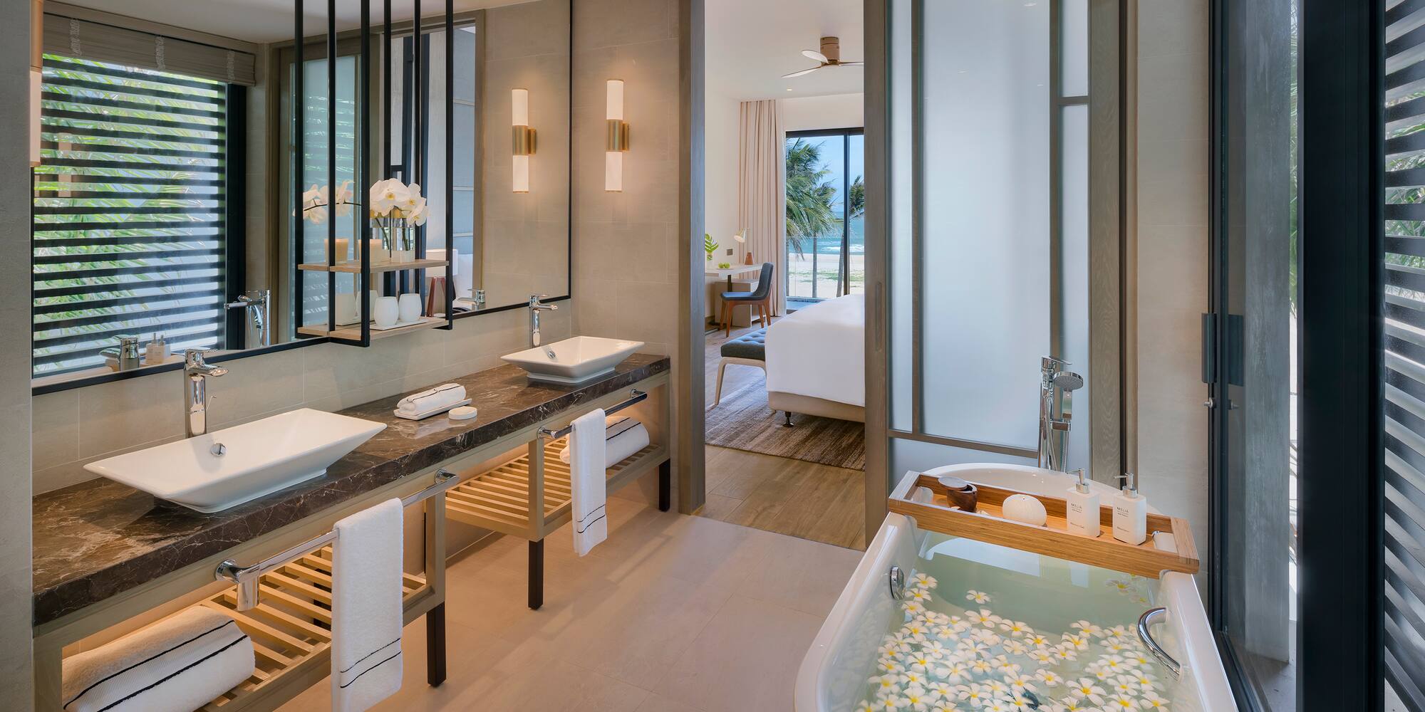 a bathroom with a bathtub and a tub