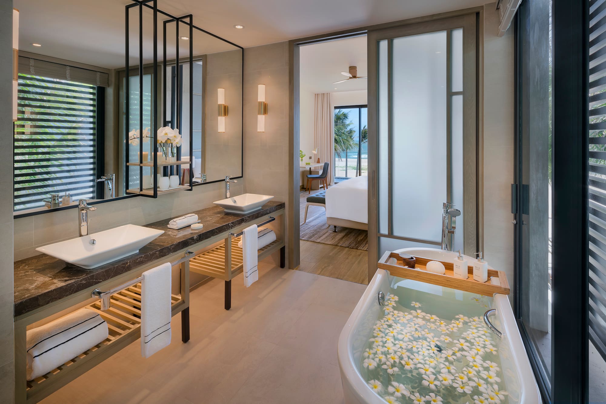 a bathroom with a bathtub and a tub