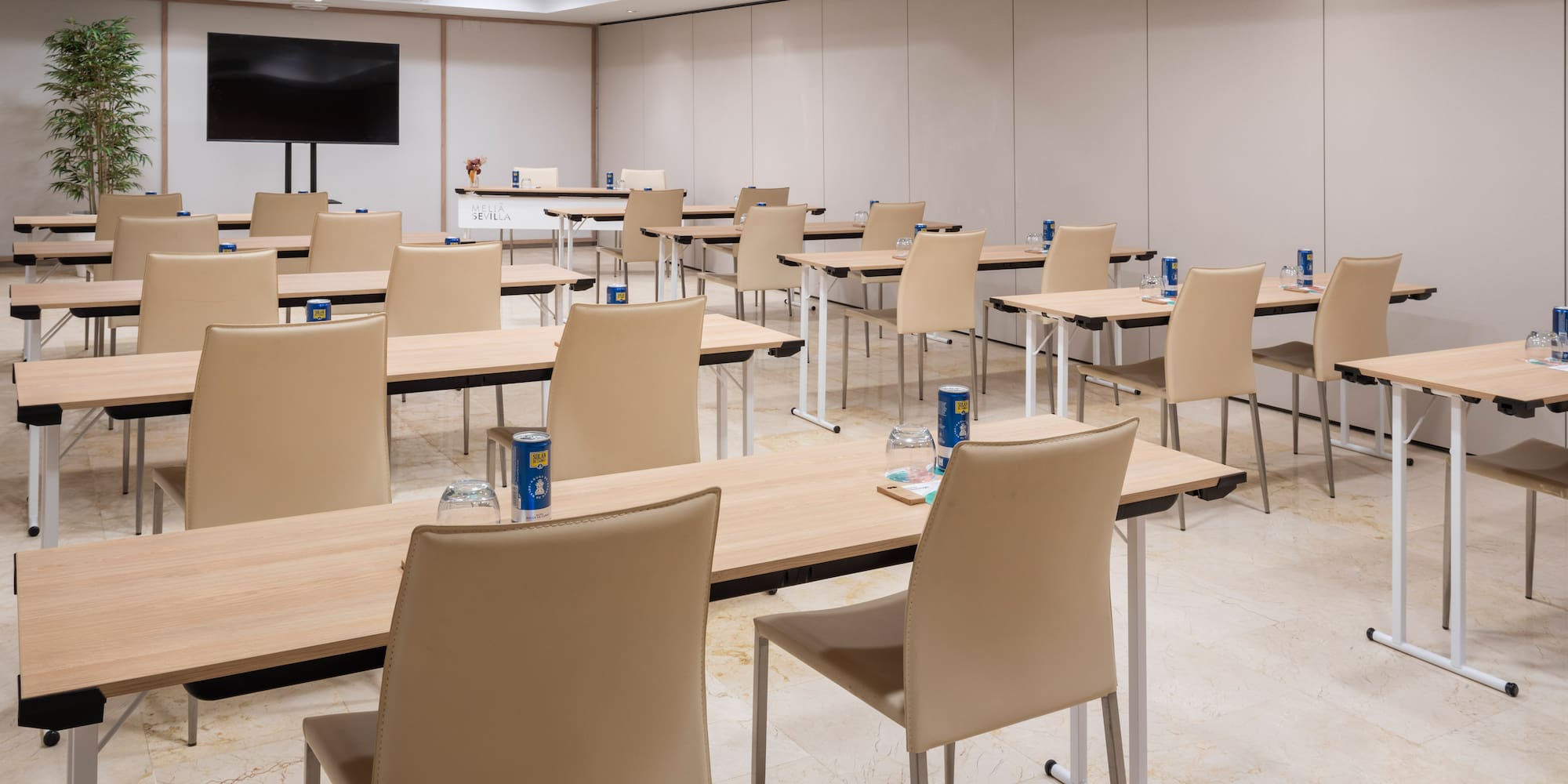 a room with tables and chairs