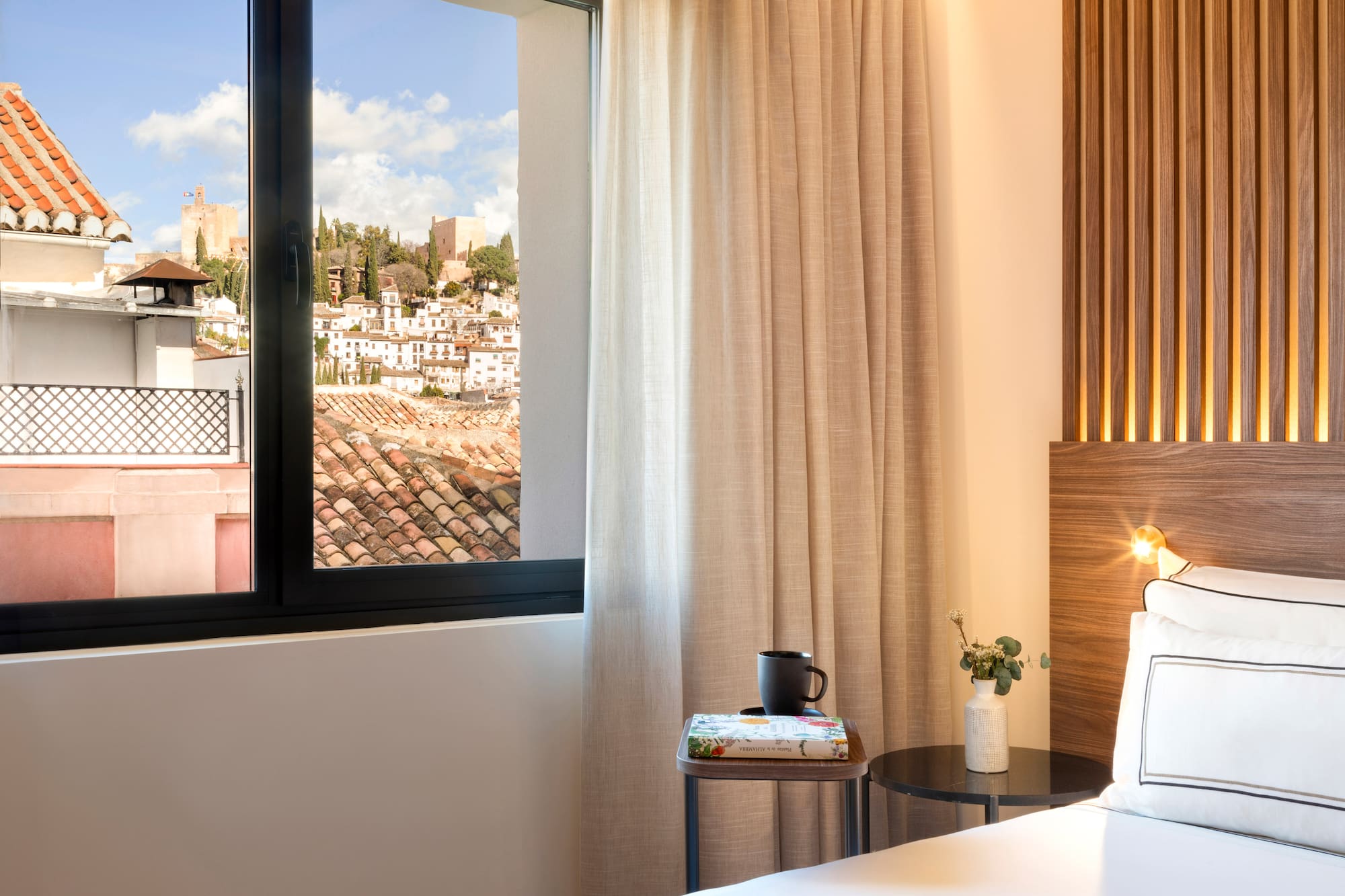 a window with a view of a city