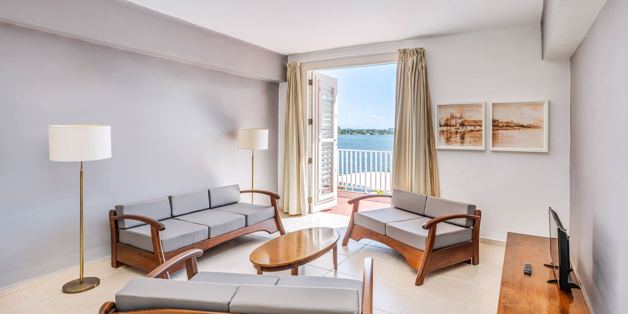 a living room with couches and a table