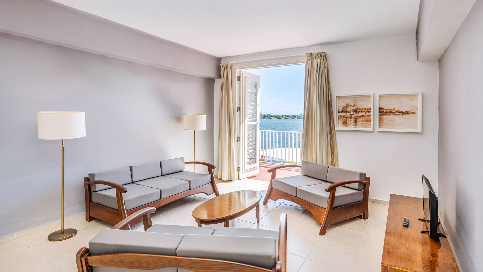 a living room with couches and a table