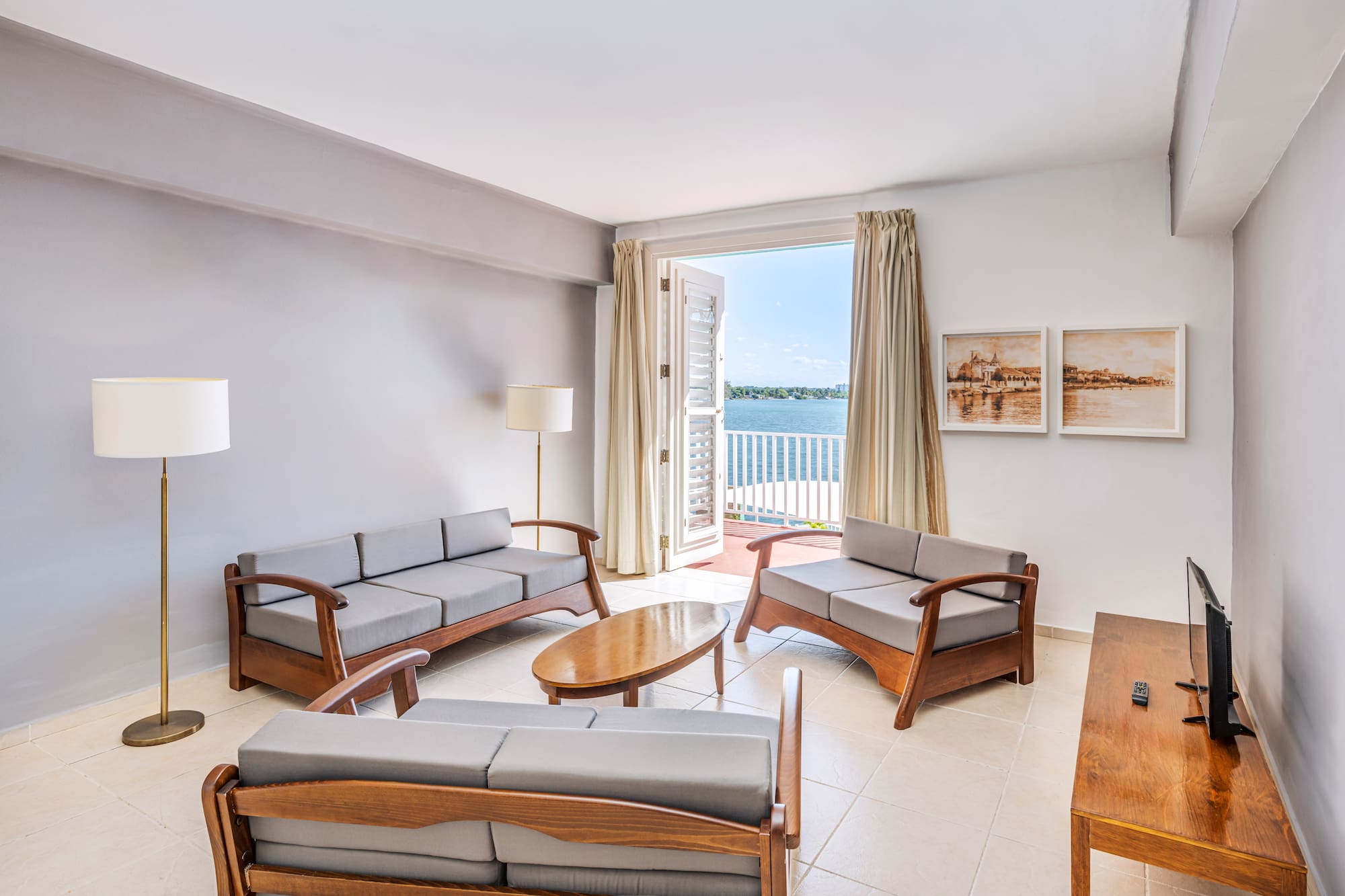 a living room with couches and a table