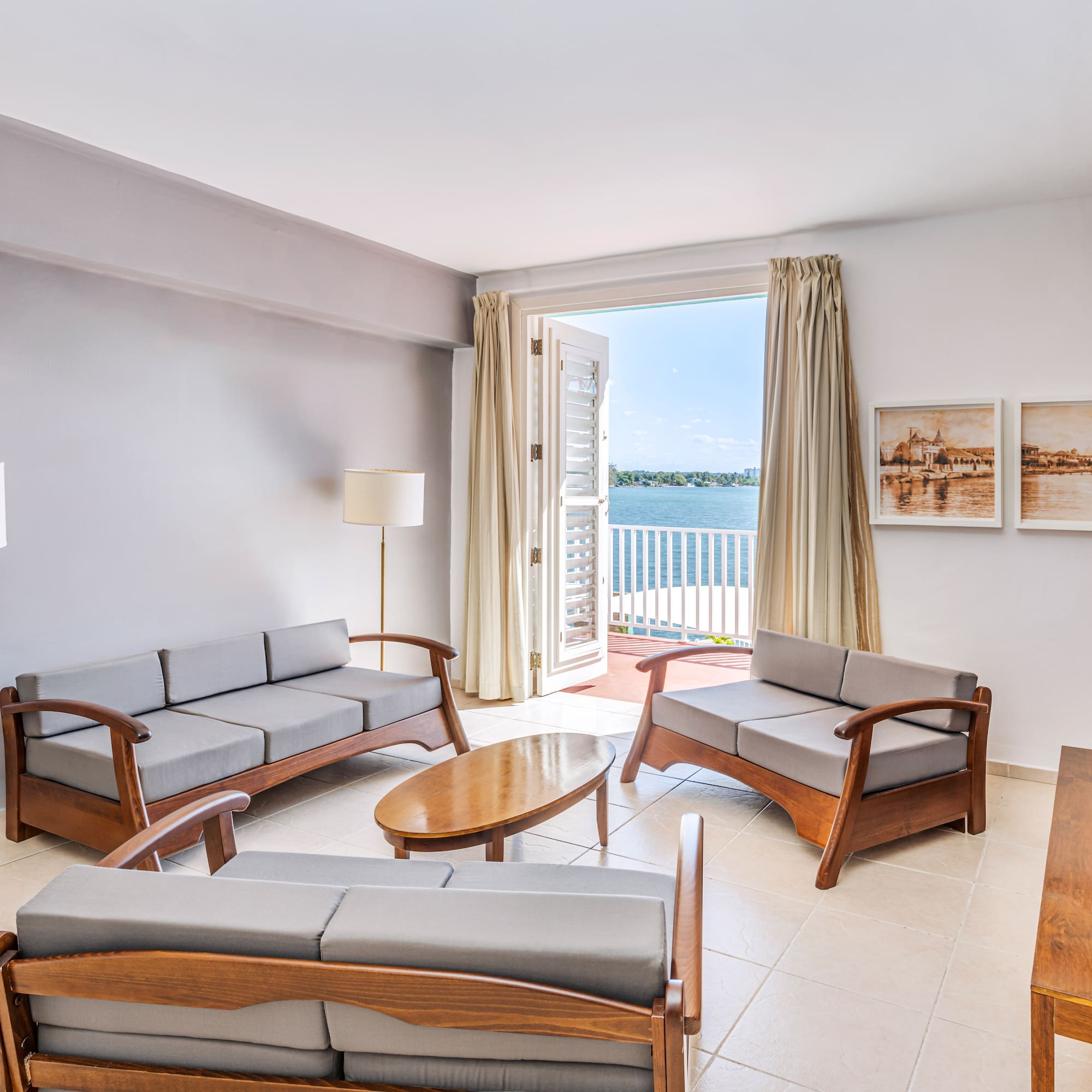 a living room with couches and a table