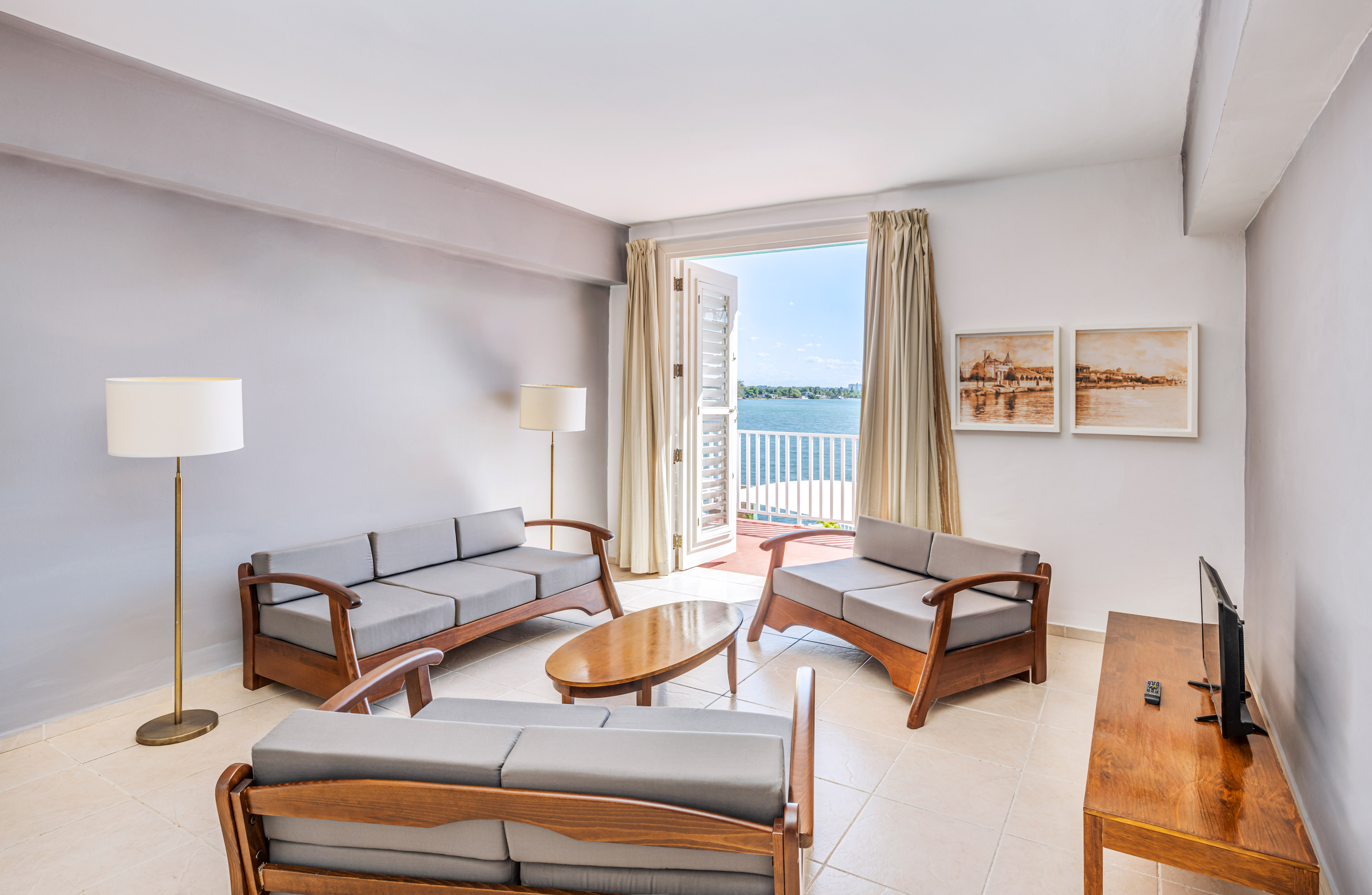 a living room with couches and a table