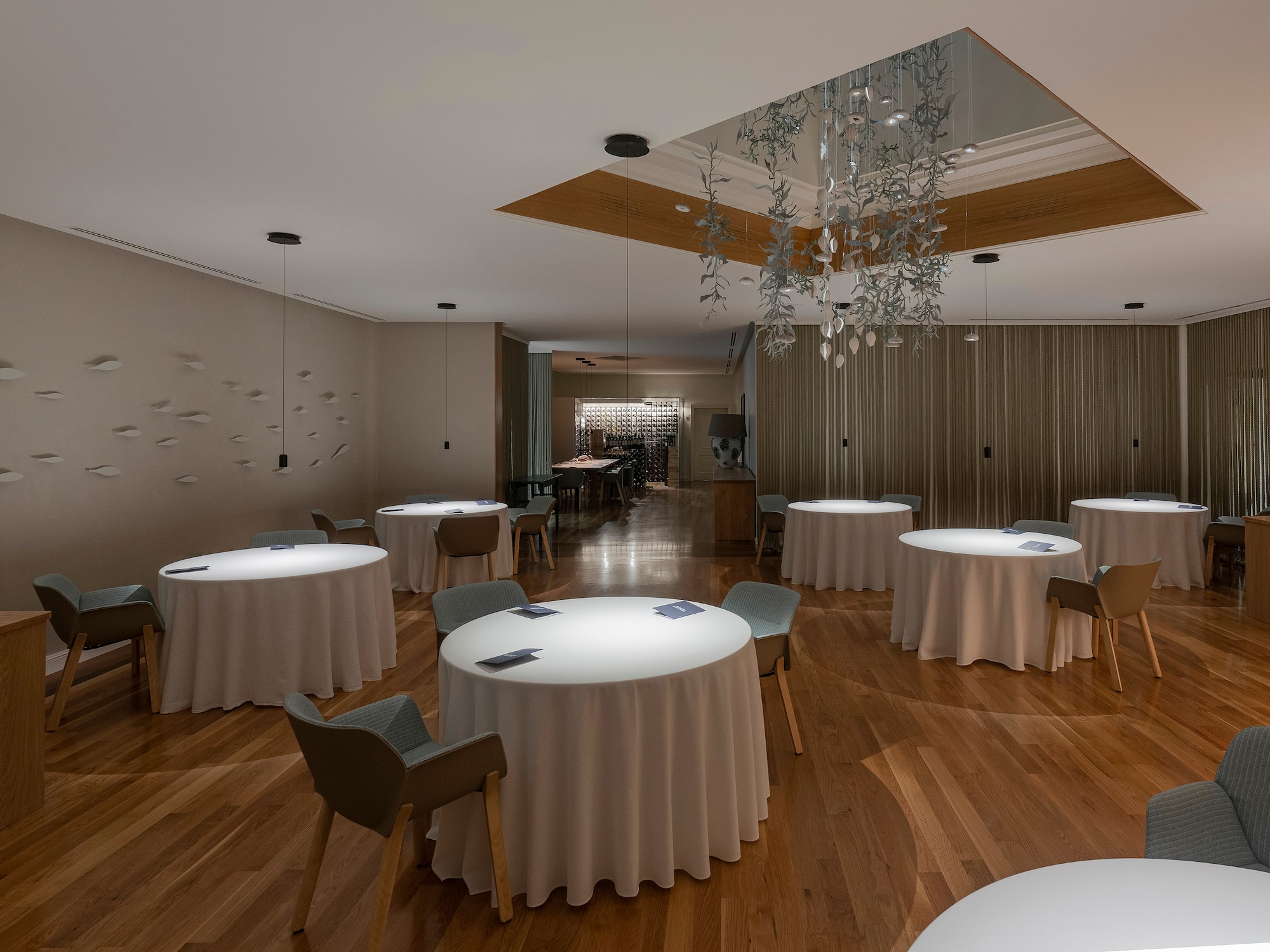 a room with tables and chairs