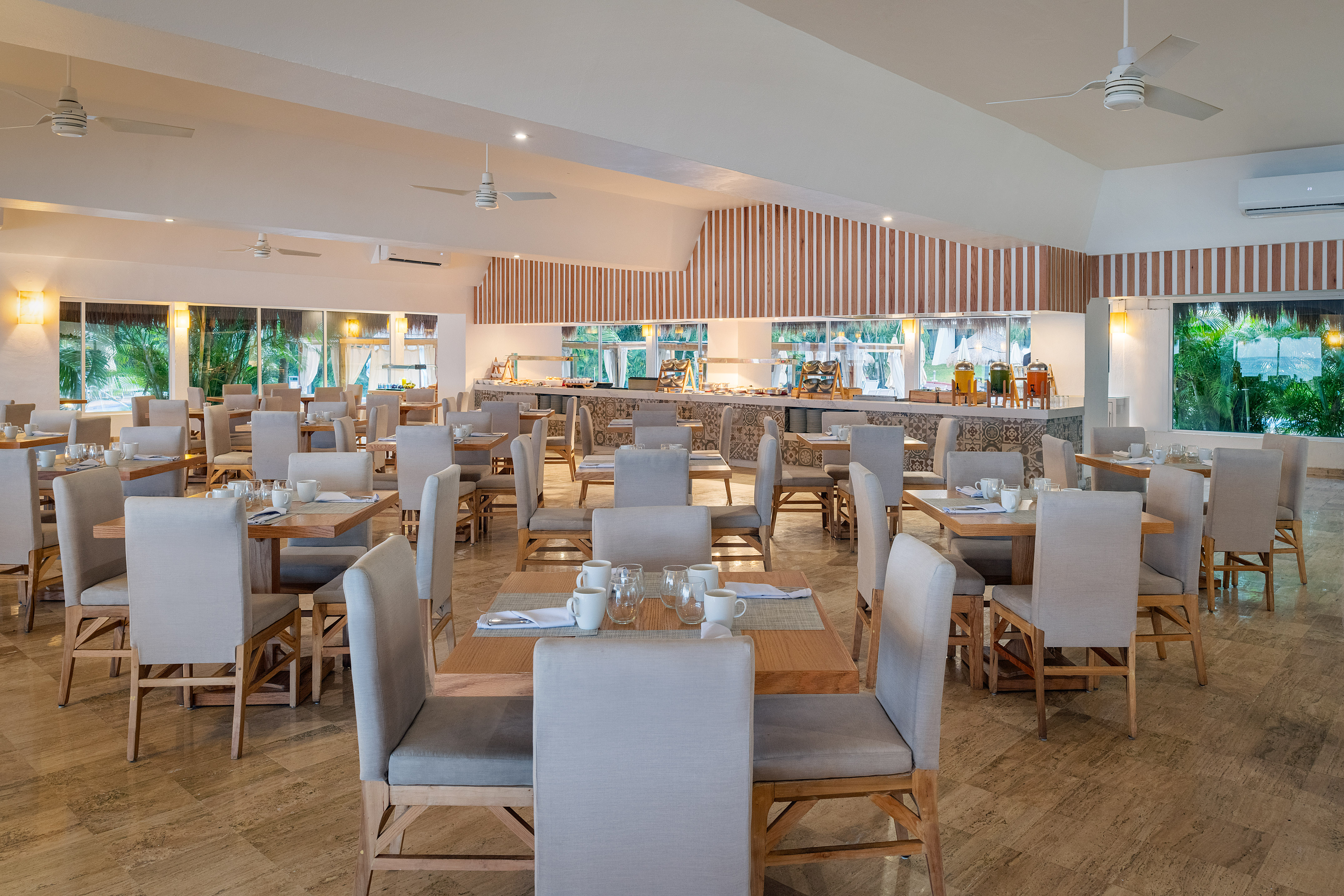 a room with tables and chairs