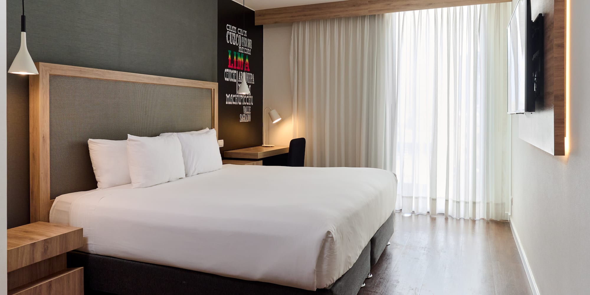 a bed in a hotel room