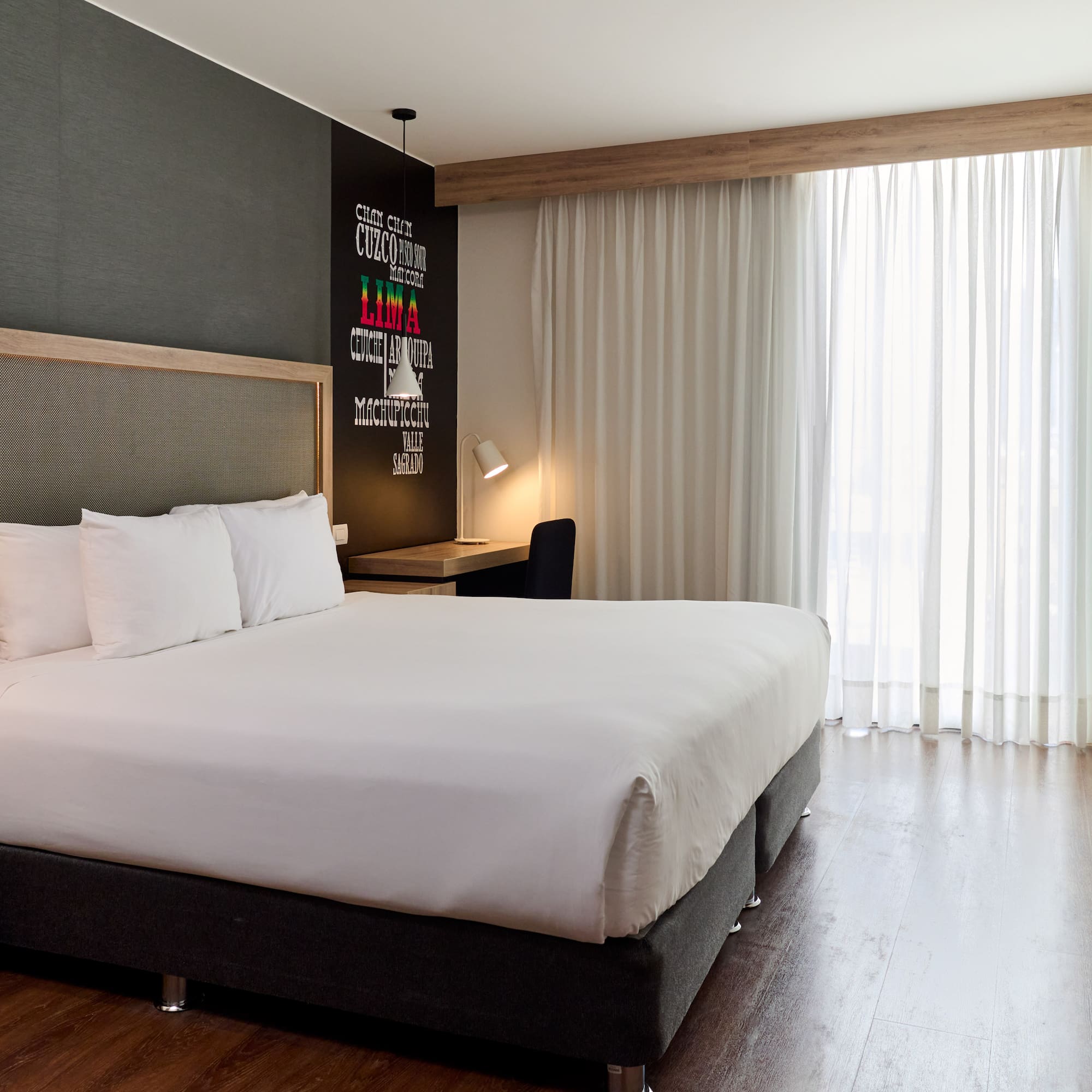 a bed in a hotel room