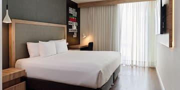 a bed in a hotel room