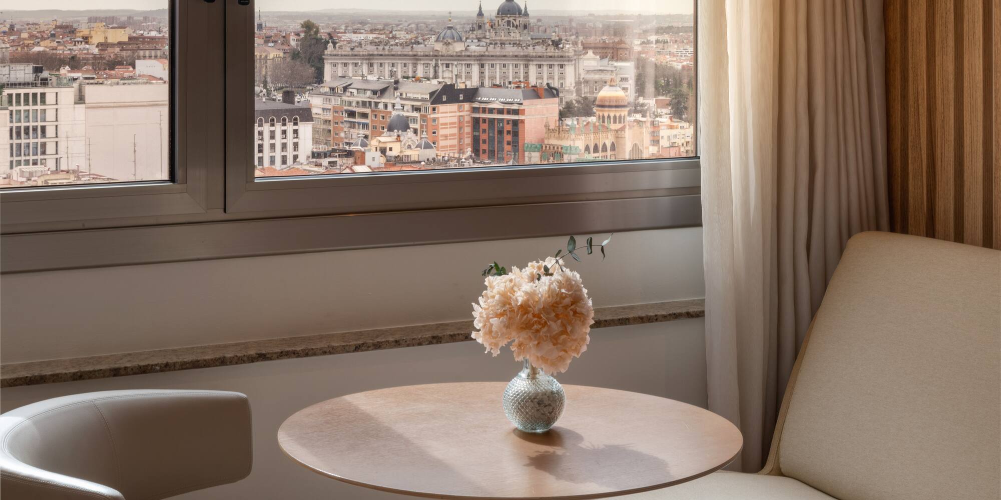 Madrid city view from hotel window, Almudena Cathedral, Royal Palace, flowers.
