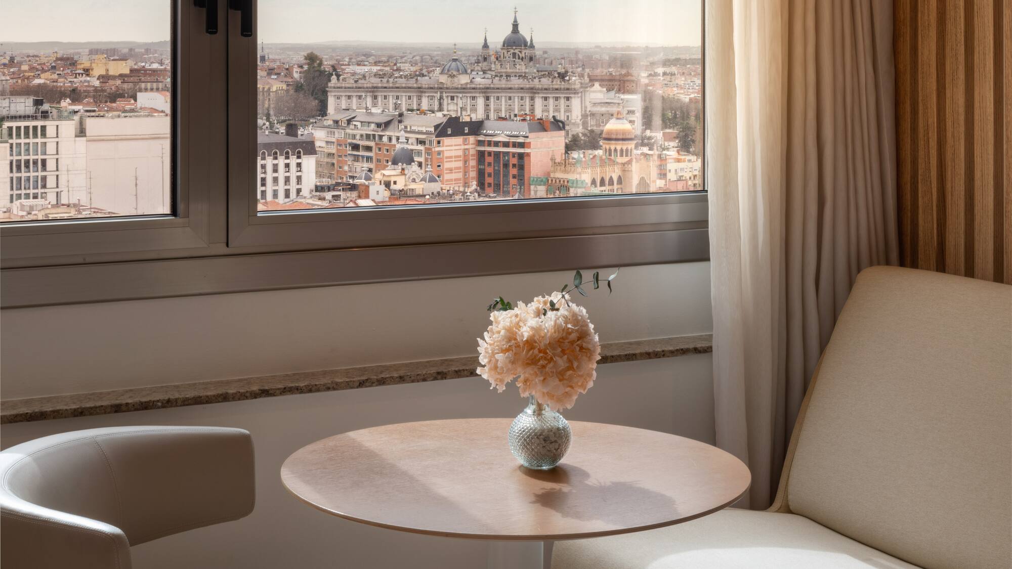 Madrid city view from hotel window, Almudena Cathedral, Royal Palace, flowers.