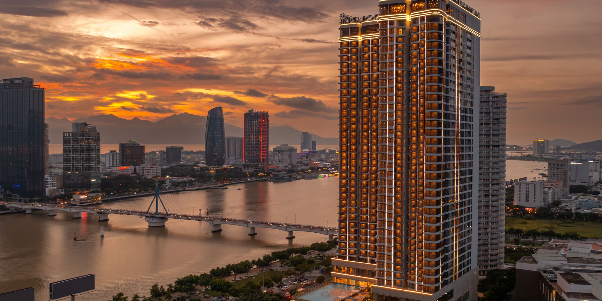 a city with a bridge and a river