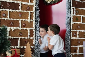 two boys standing in a doorway