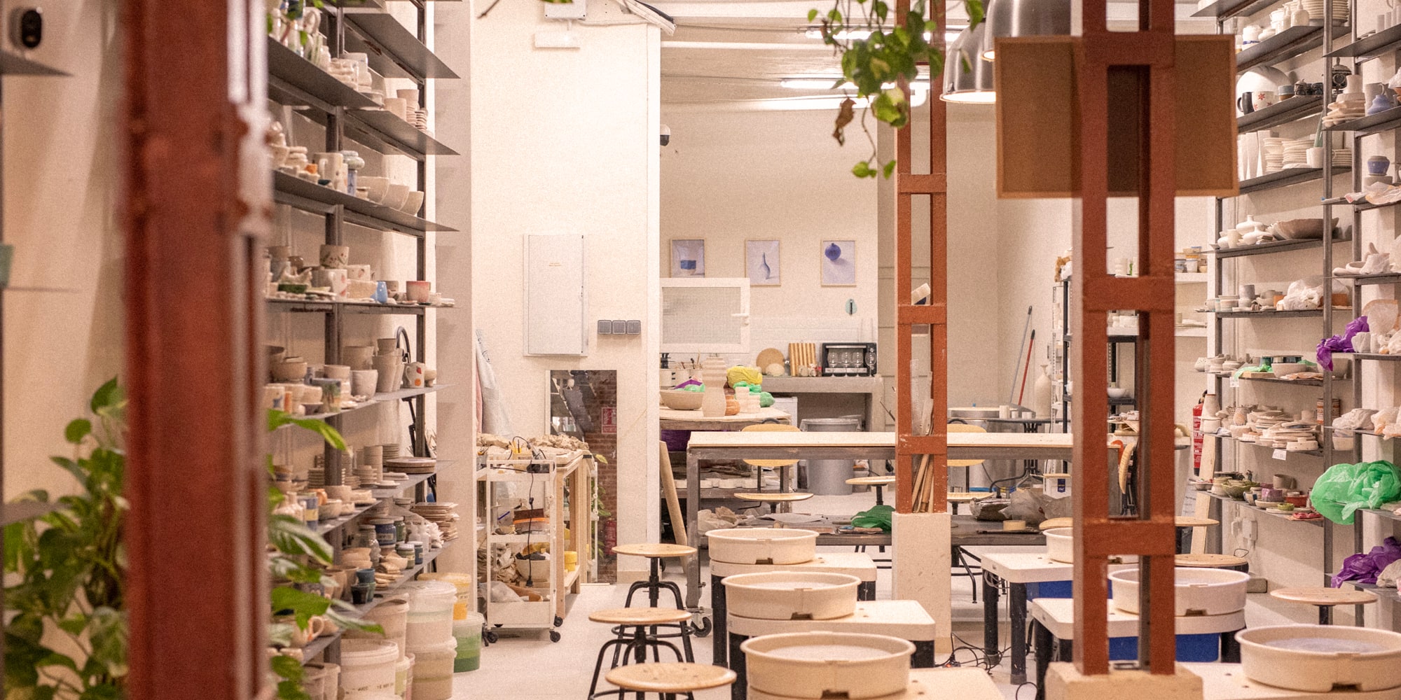a room with tables and stools
