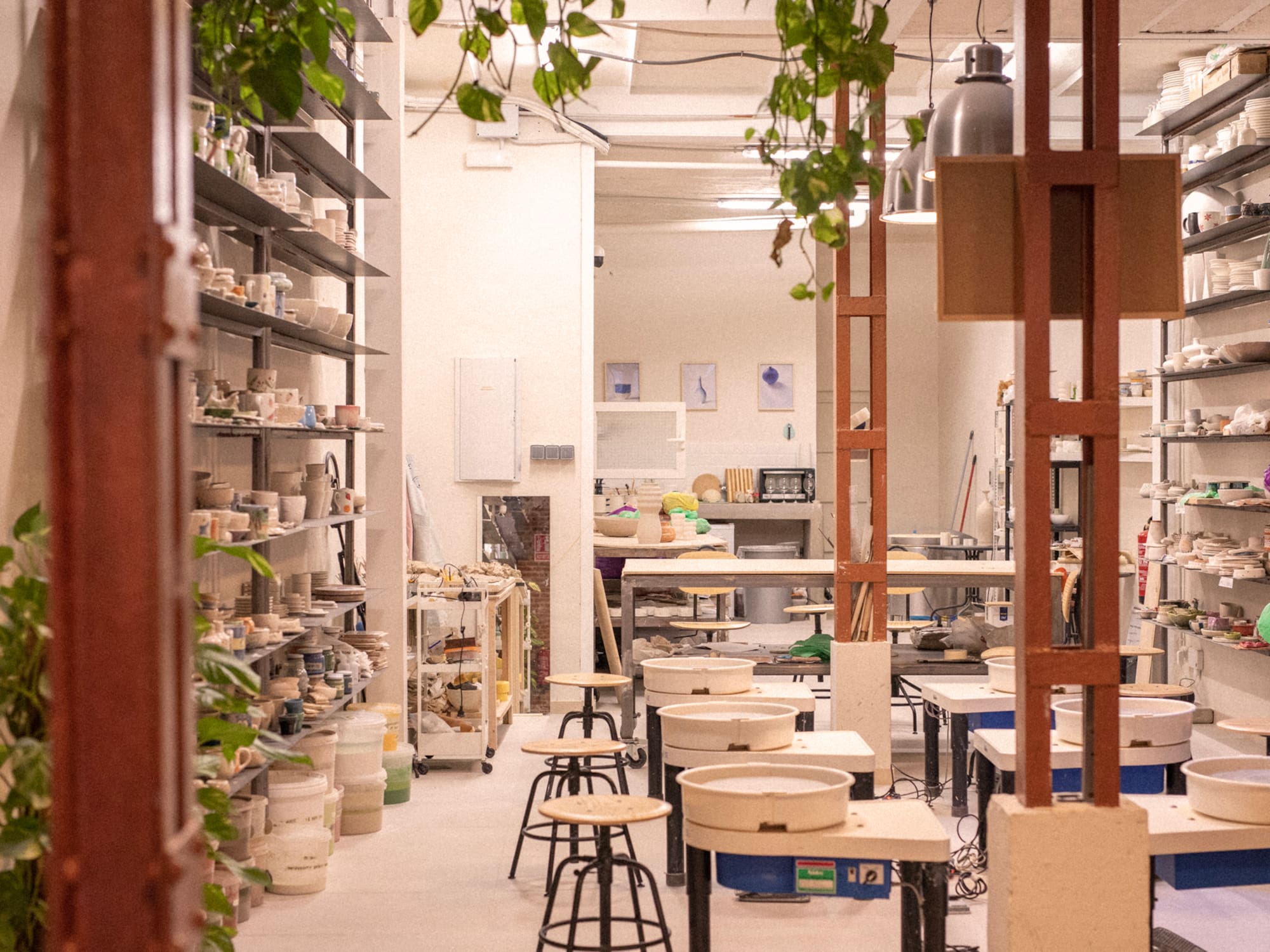 a room with tables and stools
