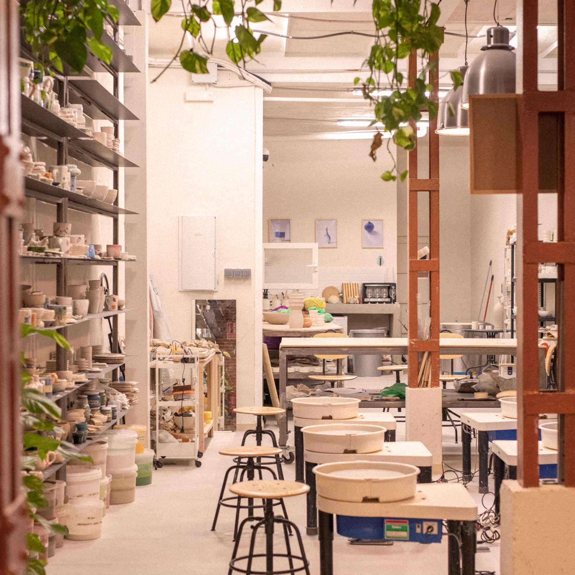 a room with tables and stools