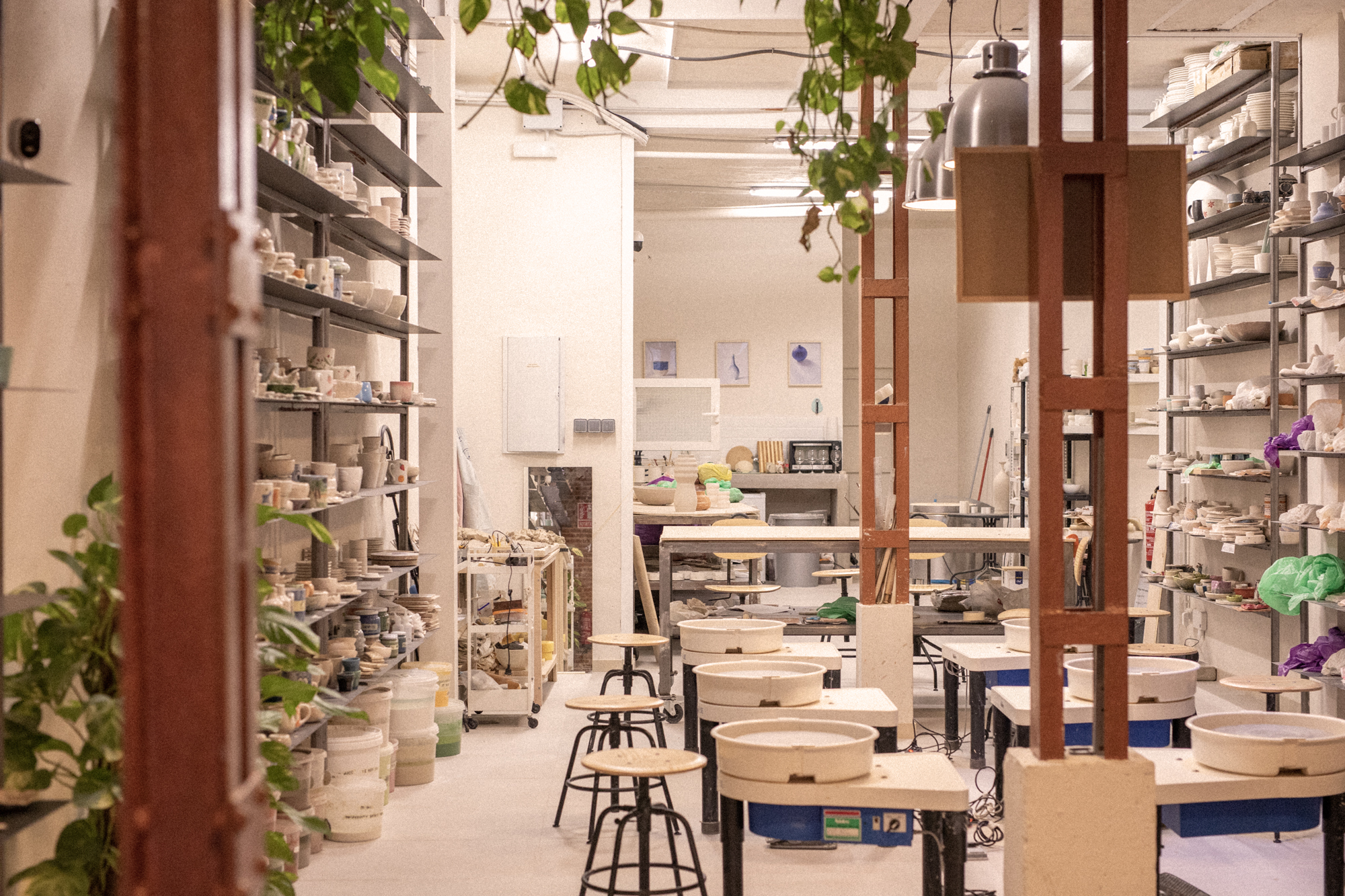 a room with tables and stools