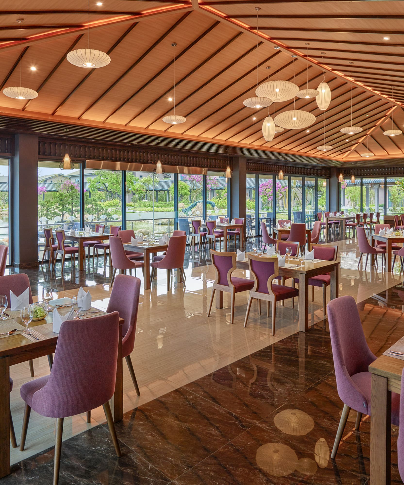 a restaurant with tables and chairs