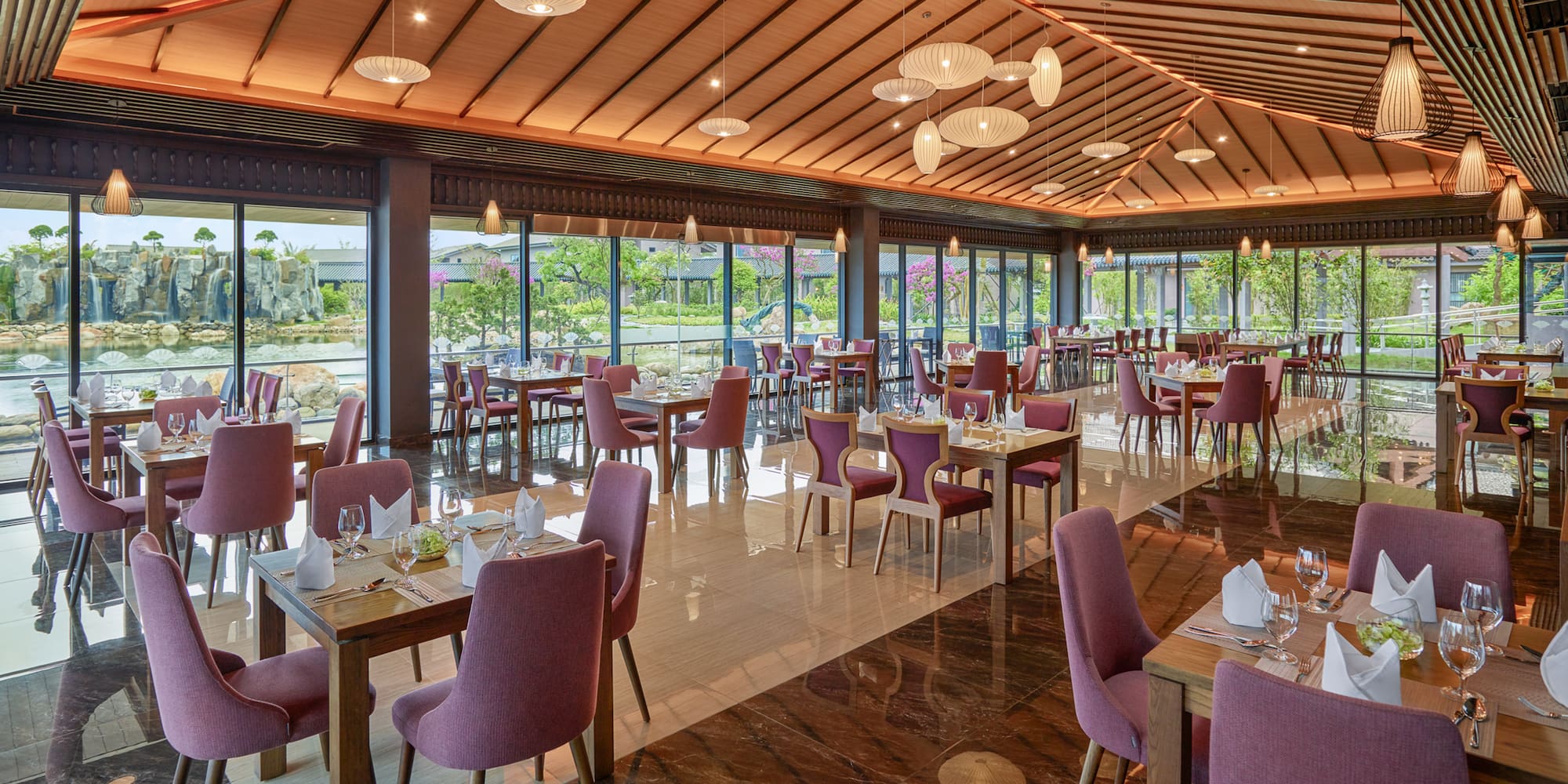 a restaurant with tables and chairs
