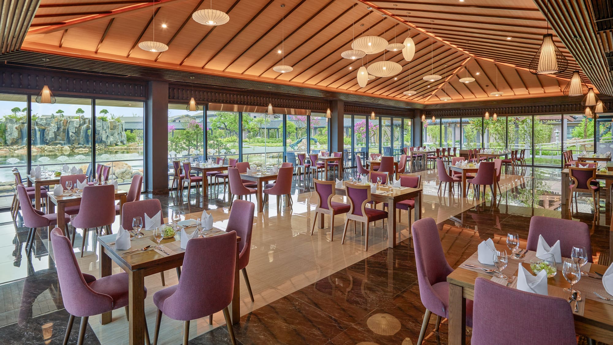 a restaurant with tables and chairs